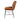 side angle view of a tan leather dining chair with steel legs