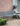 Weatherproof steel garden bench for two or three people