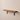 close up of the rustic shelf brackets used on this walnut shelf.