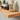 Close-up of handcrafted solid oak floating shelves showing natural wood grain