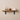 Walnut shelf with lipped brackets in a kitchen