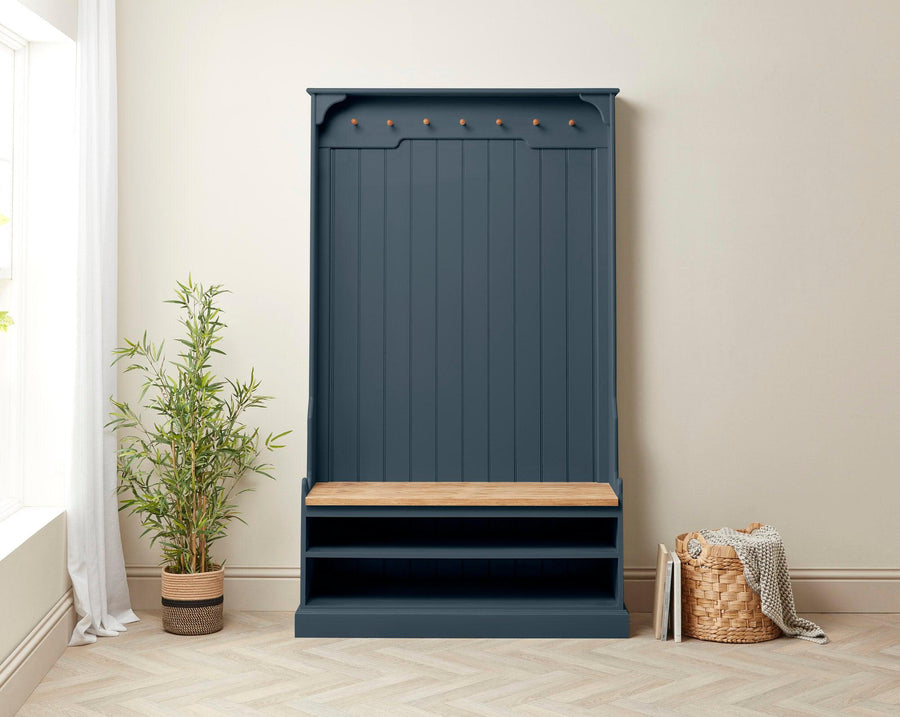 Front view of a hallway coat and shoe storage bench