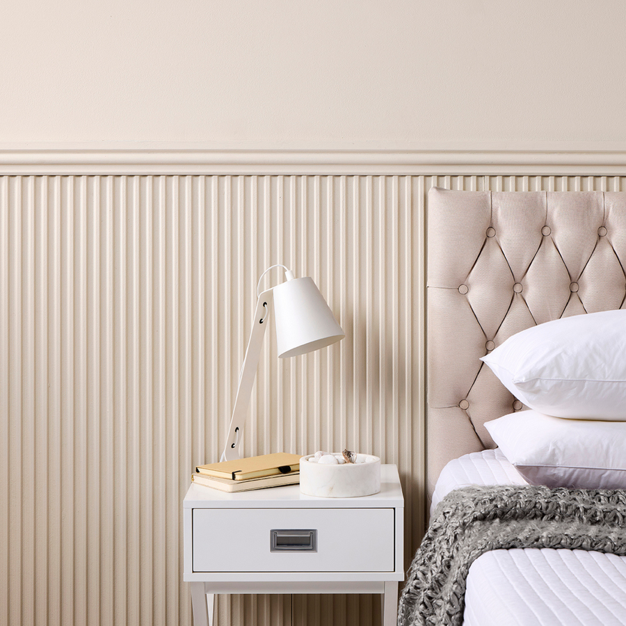 Fluted MDF wall panels in a modern bedroom, half wall panelling, painted adding texture and depth to the space