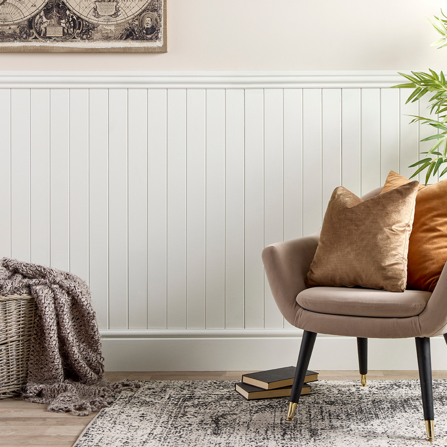 Tongue and groove panelling installed in a hallway, painted white for a classic interior look.