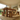 low angle view of chunky pine dining table and bench set showing thick legs and solid construction
