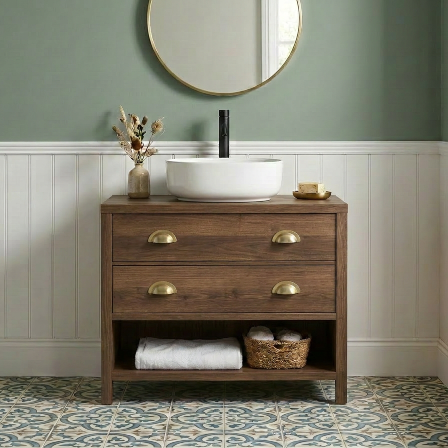 Freestanding wooden vanity unit with two drawers and an open shelf in a bathroom in a dark wax finish