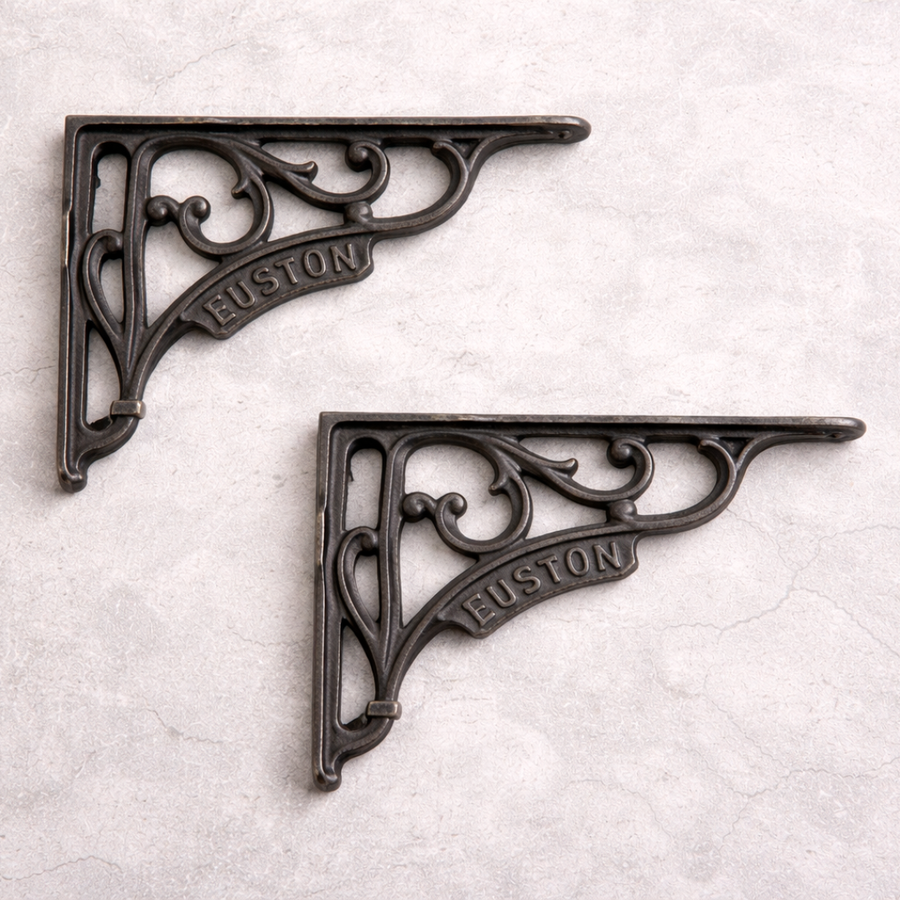 Two decorative metal brackets with 'Euston' branding on a light gray background