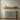 Narrow oak radiator shelf mounted above a radiator, slim solid oak with no visible brackets