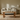 Harrogate oak coffee table with a beige sofa, wooden coffee table, and lamp against a striped wall.