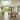 oak dining table with a frame legs and chairs in kitchen
