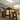 close up of solid oak dining table showing grain and a frame legs