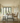 Side view of solid oak dining table and bench set with A frame steel legs showing structure, leg position and overall proportions