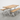 solid oak dining table and bench set with white metal x frame legs isolated on white background