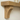 Close up of a shaped arched oak corbel bracket supporting the shelf, showing the grain