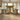 low angle view of solid oak dining table and benches showing T leg base and central stretcher support