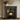 Victorian pine fire surround painted dark charcoal grey, installed with black wood burning stove