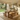 chunky pine farmhouse dining table and bench set with thick straight legs in bright kitchen with garden view