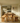 side view of chunky pine farmhouse dining table and benches showing proportions and heavy leg design