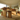 low angle view of pine pedestal dining table and bench set showing solid block base and heavy construction