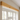 Decorative pine window beam above kitchen window showing slim profile and clean grain
