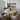 close up of round wooden dining table showing wood grain and hairpin legs