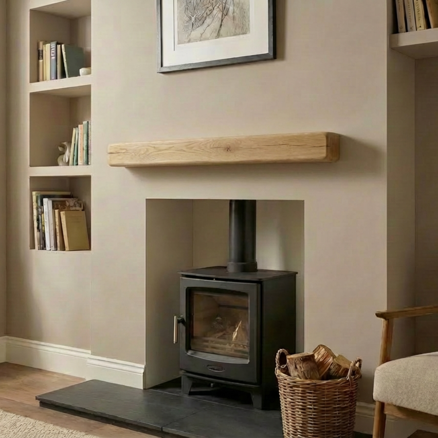 Rustic oak fireplace beam 10x10 mantel beam installed above a wood burning stove in a British living room