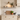Deep rustic oak floating shelf with concealed brackets and no visible fixings on a kitchen wall