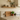 Rustic oak floating shelf in solid oak, wall mounted above a kitchen counter with bowls and a jug