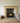 Rustic pine fire surround installed above a wood burning stove, stone chimney breast, natural finish