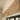 Decorative oak window beam above window showing slim profile and natural wood grain