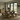 solid oak dining table and bench set with chunky x frame legs in kitchen
