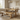 solid oak pedestal dining table with matching benches in modern dining room showing clean surface and open base design