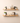 Set of two solid oak shelves with brackets in a modern room.