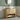 freestanding wooden vanity, round mirror, and patterned floor.