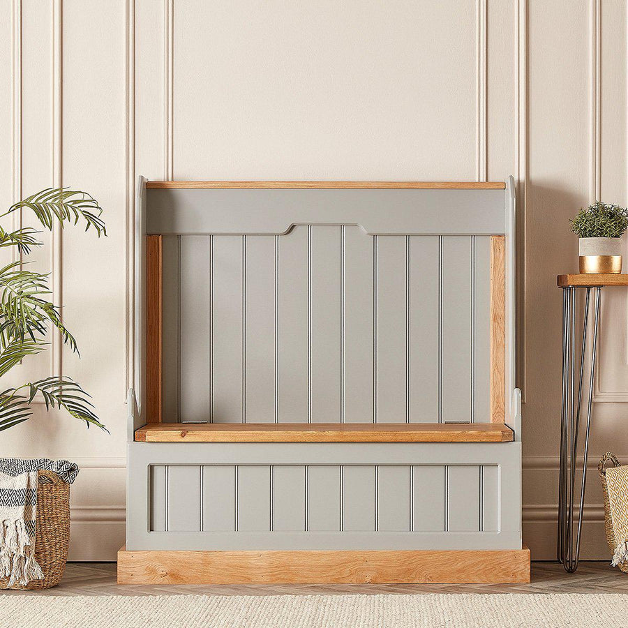 Front view of a painted monks bench with storage
