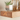 Wooden shelf above a radiator styled with plants and décor, handcrafted solid wood